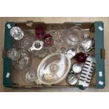 A collection of glass wares including decanters, ruby glass, silver topped decanter, claret jug with