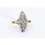A Victorian diamond and 18ct gold cluster ring, comprising a marquise shaped cluster of claw set old