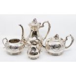 A Victorian style four piece tea and coffee service, engraved floral decoration, the covers with
