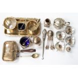 A group of silver to include: set of five Apostle teaspoons, mustard pot & cover, pepper pot &