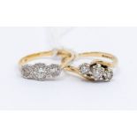 A diamond and 9ct gold three stone ring, comprising three round brilliant cut diamonds with a