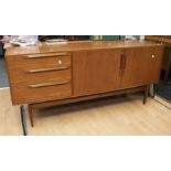 Circa 1960's/70's teak Mackintosh sideboard with three side drawers and two cupboard doors