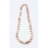 A fresh water cultured pearl  necklace, comprising alternate peach, cream, pink and purple tone