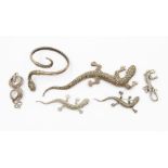 A collection of vintage silver jewellery to include three gecko brooches set with marcasite, the