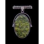 A Scottish silver hardstone swivel brooch, comprising a decorative lapel bar brooch suspending an
