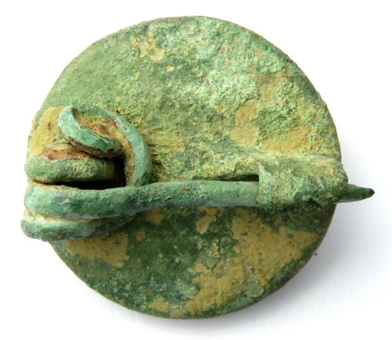 Roman Brooch.  Circa 2nd-3rd century AD. Copper-alloy, 11.30 g, 23.85 mm. A wheel type plate - Image 3 of 3