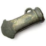 Late Bronze Age Socketed Axe.   Circa, 1000 B.C. Copper-alloy, 99.56 mm. A square-mouthed socketed