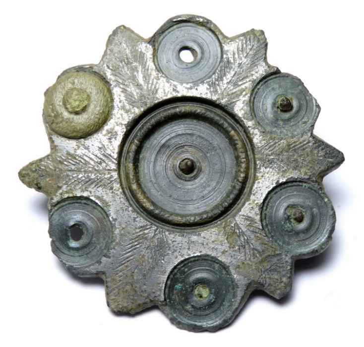 Roman silvered plate brooch. A large, early plate brooch silvered on the front face with a