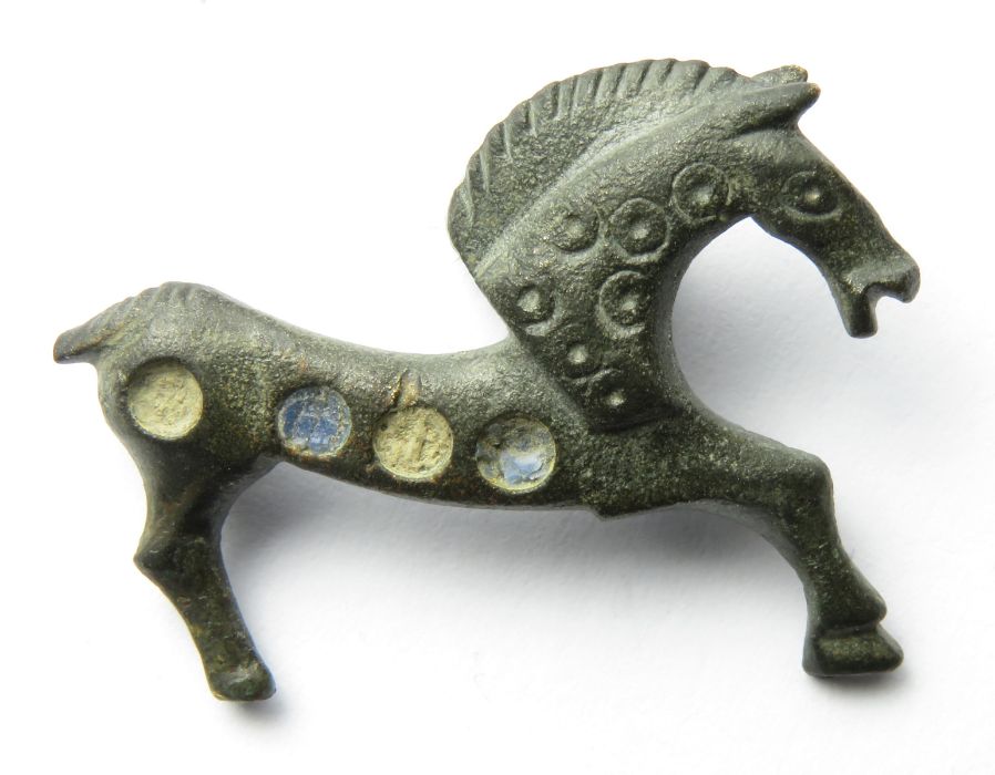 Roman Horse Brooch  Circa, 2nd century AD. Copper-alloy, 28mm x 22mm, 4.2g. A zoomorphic plate