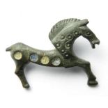 Roman Horse Brooch  Circa, 2nd century AD. Copper-alloy, 28mm x 22mm, 4.2g. A zoomorphic plate