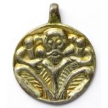 Viking Silver-Gilt Odin Pendant. Circa 10th-11th century AD. Silver, 36mm x 30mm diameter, 8.9g. A