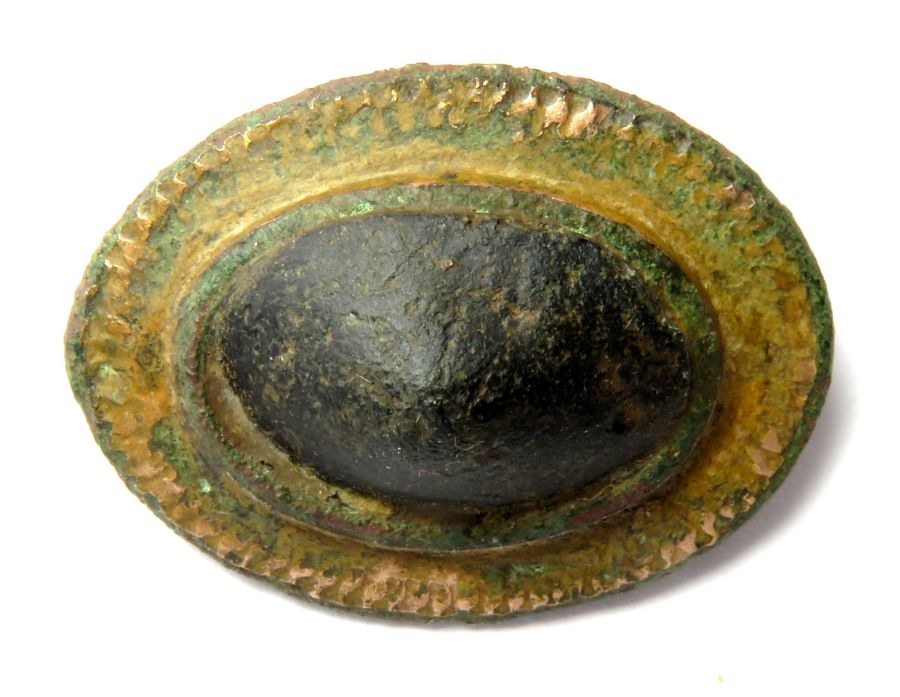 Roman Brooch.  Circa, 2nd-3rd century AD. Copper-alloy/glass, 7.09 g, 27.03 mm. An oval gilded plate