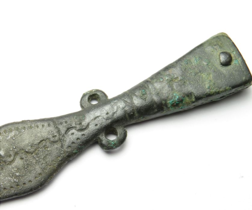 Roman Strap-End  Circa, 4th century AD. Copper-alloy, 70 mm x 17 mm. 10.6 g. A cast bronze strap end - Image 4 of 4