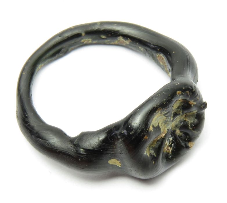 Roman Glass Finger Ring   Circa 2nd -3rd century AD. Glass, 2.15 g, 23.22 mm. Ring size, UK. K.