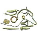 Ancient Artefacts  A mixed group of pre roman pieces including, pins, an awl, bead, mount and a