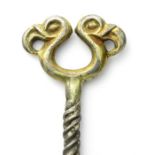 Viking Period Silver-Gilt Pin. An impressive Scandinavian dress pin with a twisted upper shaft and
