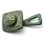 Romano-British Fastener.  Circa, 1st century AD. Copper-alloy, 39mm x 20mm, 16.4g. A toggle formed