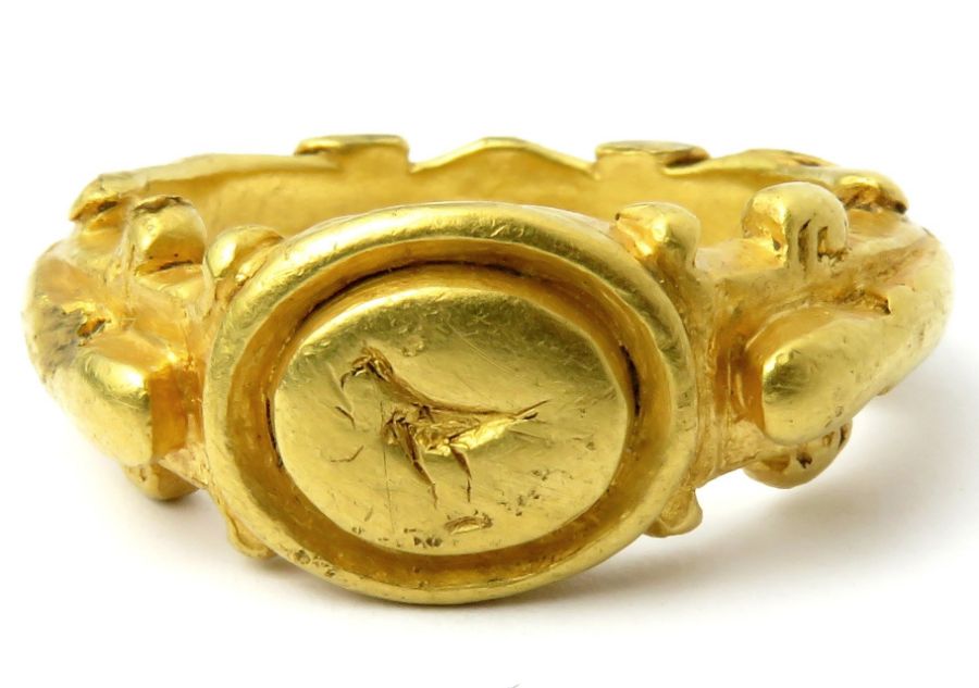 Roman Gold Ring  Circa 2nd century AD. Gold, 22.85 g, 29mm x 25mm; bezel 13mm x 11mm. An