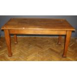 A late 19th century oak dining table, the rectangular top with moulded edge, on square tapering legs