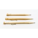 A collection of pencils to include a 9ct gold Yard-O-Lead, machine engraved decoration, length