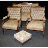 A late Victorian rosewood, line inlaid and marquetry inlaid three piece suite, upholstered in