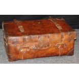 A large Edwardian stitched leather and brass studded cabin trunk, named O M Williams, 32 x 80 x 53cm