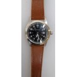 A Hamilton Khaki automatic wristwatch, with black 3.5cm calendar dial, on leather bracelet. Case