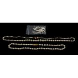 A graduated cultured pearl necklace with 9ct gold clasp set with amethyst and a cultured pearl,