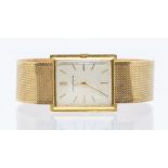 A 9ct gold gents vintage Juvenia quartz  watch, rectangular champagne dial with applied baton