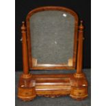 A 19th century burr walnut toilet mirror, the arched plate within octagonal tapering horns over