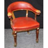 A Victorian mahogany framed, red close studded hide upholstered library chair, having bow back,