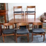A mid century Austin table and chairs