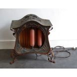 An early 20th cent cast iron fire (A/F) Condition: a bulb missing