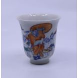 **WITHDRAWN**A porcelain cup with floral rim