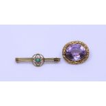 An amethyst gold brooch and similar secessionist turquoise brooch