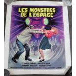 A vintage movie poster "Les Monstres"