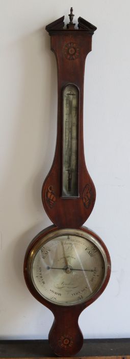 **WITHDRAWN**A George III mahogany wheel barometer c. 1800 , in a shaped case inlaid with paterae