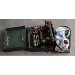 A collection of miscellaneous, and a typewriter