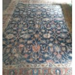 An antique large Persian rug , at fault