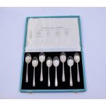 A cased set of  8 British Hall mark spoons,