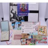 A collection of football interest related items including a signed Alan Ball card