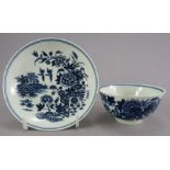 An eighteenth Worcester transfer-printed blue and white porcelain Fence pattern tea bowl and saucer,