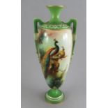 A Royal Worcester porcelain hand-painted tall two-handled vase, c. 1900. It is decorated with