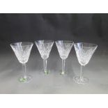 A Set of four Waterford Crystal wine glasses. Moon Coin Cut. Marked Waterford   Made in the Republic