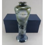 A twentieth century boxed (in a Moorcroft box) Cobridge Pottery tall vase decorated with a