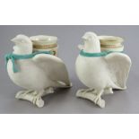 Two similar Royal Worcester vases each modelled as a dove perched on a branch supporting a ribbon
