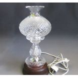 A Waterford Crystal “Prestige” Mood Lamp in two parts on a Mahogany plinth. Marked Waterford