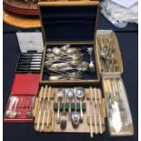 A collection of silver plated flatware, comprising:- a wooden canteen; fish knives and forks;