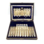 A cased set of silver dessert flatware, comprising:- six dessert spoons, sugar tongs, six knifes and