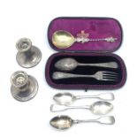 A Victorian child's silver spoon and fork with engraved decoration, London 1890, cased, a